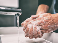 Washing hands with soap and water